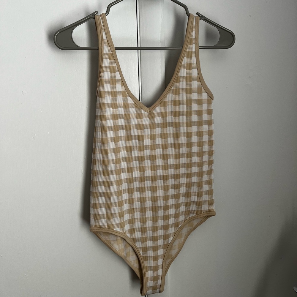 Never worn body suit